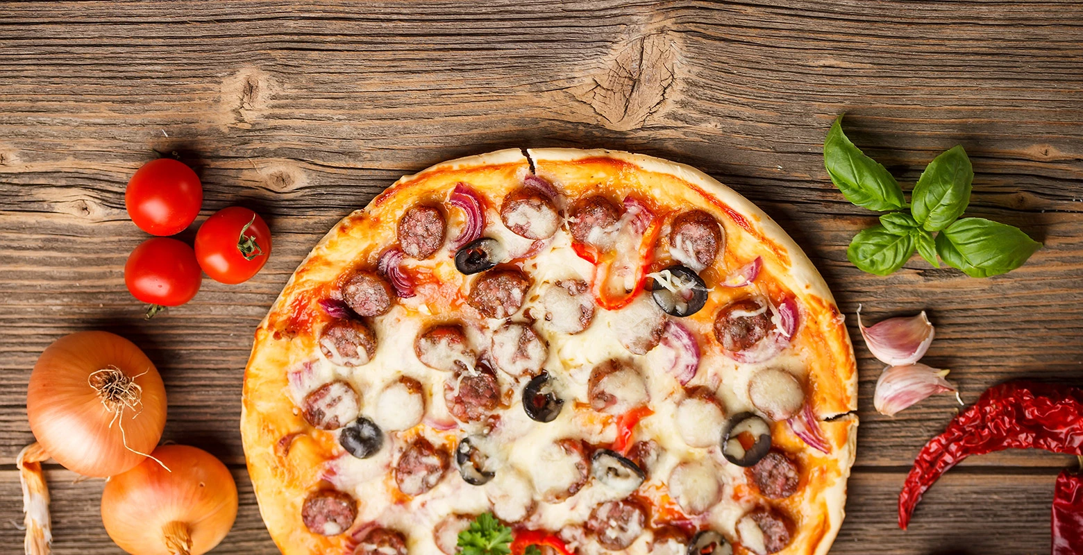 Boss Pizza Edmonton - Organic pizza restaurant serving Indian-inspired flavors with locally sourced ingredients